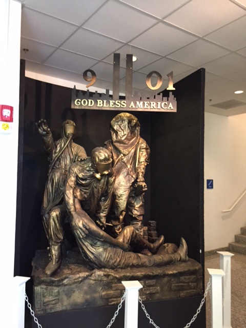 A photo of a statue dedicated to the responders and victims at the 9/11 terrorist attacks